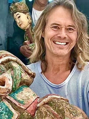 Brian Linden with traditional sculpture